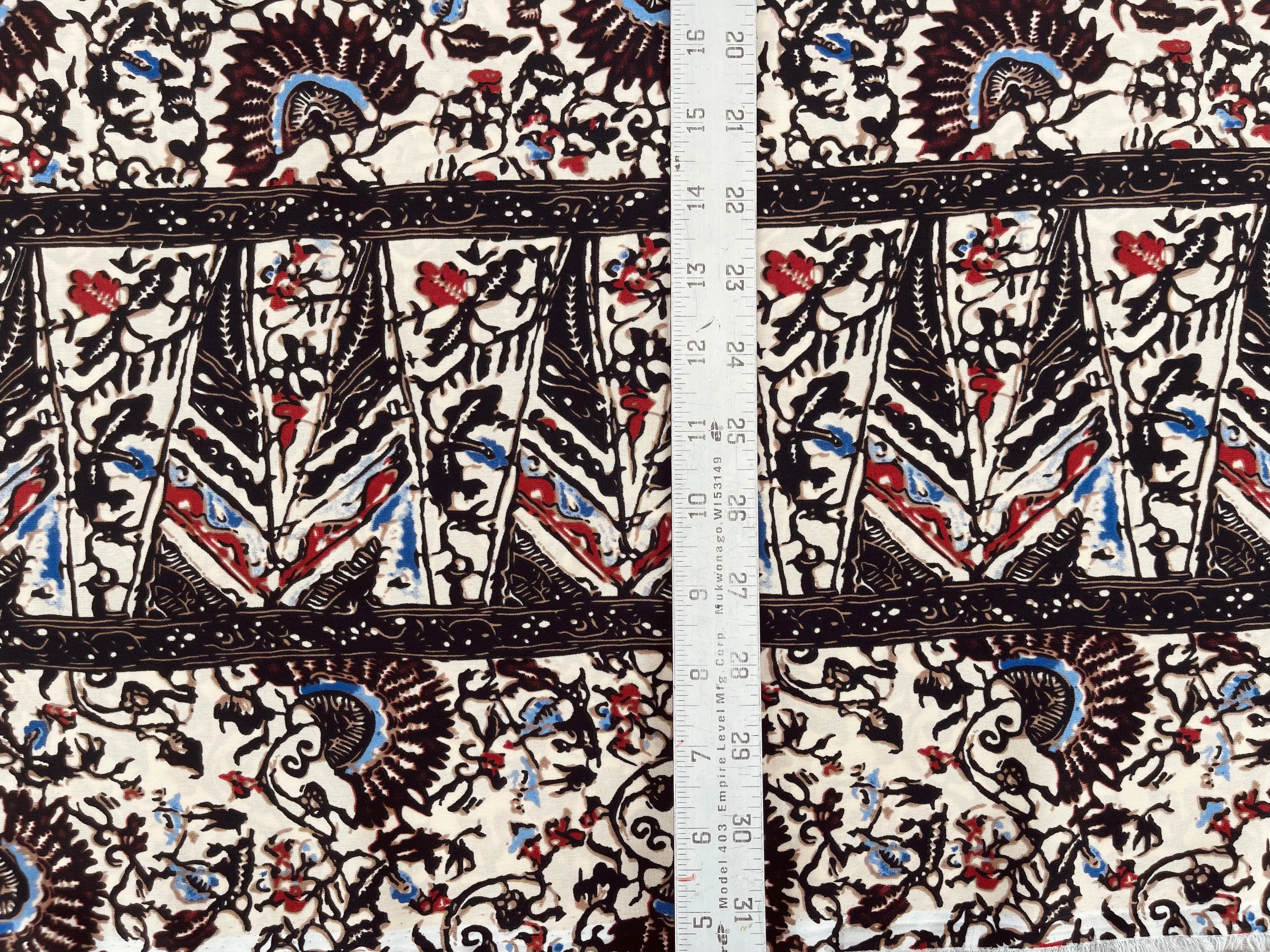 Tribal Boho Woolpeach  fabric by the yard - Floral border brown blue print