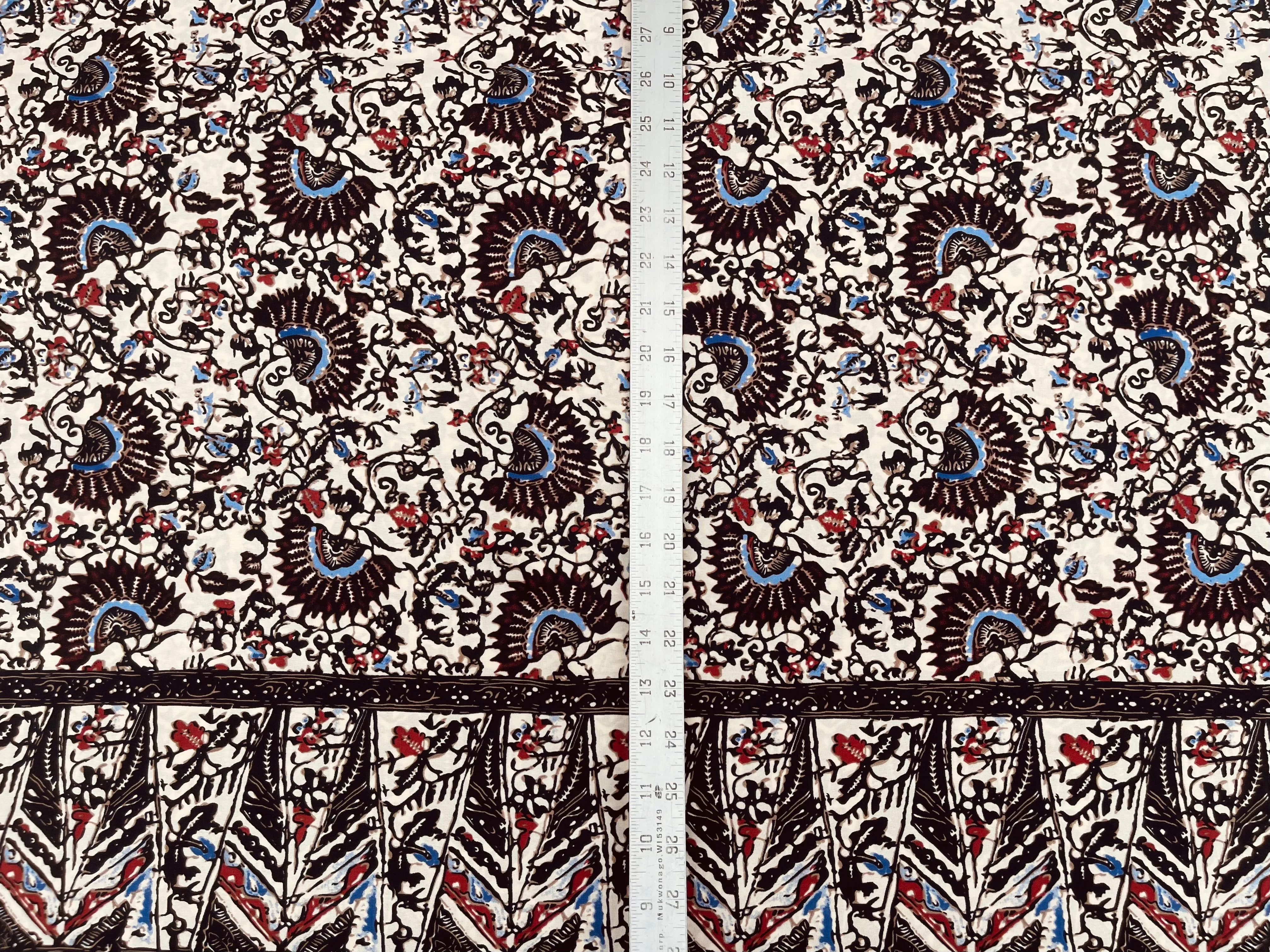 Tribal Boho Woolpeach  fabric by the yard - Floral border brown blue print